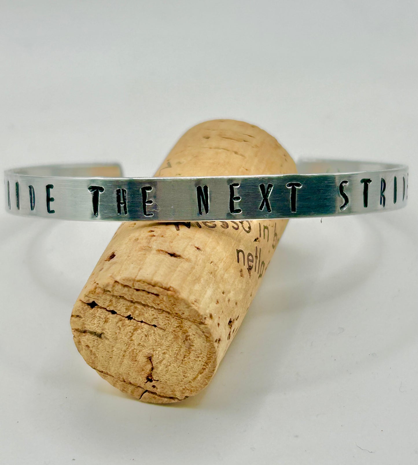 RIDE THE NEXT STRIDE - LUKE REINBOLD - HAND STAMPED BRACELET